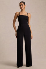 Raquel | Black Asymmetric-Neck Jumpsuit With Twisted Cape Detail